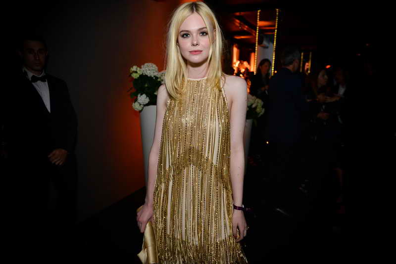 Elle Fanning was dressed in PRADA while attending the Vanity Fair’s 2017 Cannes Party on May 20th, 2017.