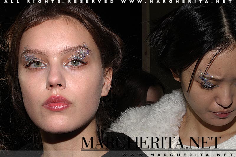 Make-up at Genny FW 2018 2019. Glitter eyes and a beautiful skin. Make-up: Lloyd Simmonds