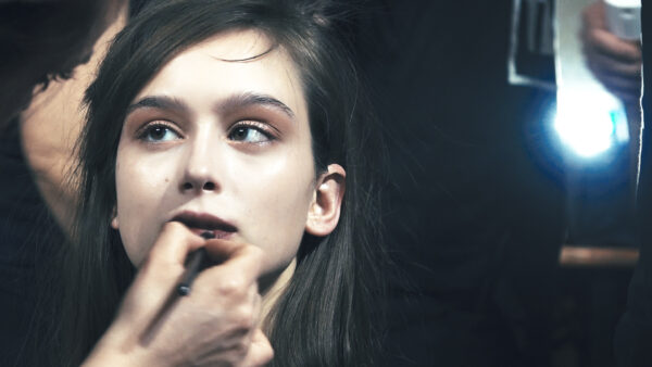 A slightly imperfect lip and pink cream shadow around the eye with Terry Barber backstage at Au Jour Le Jour
