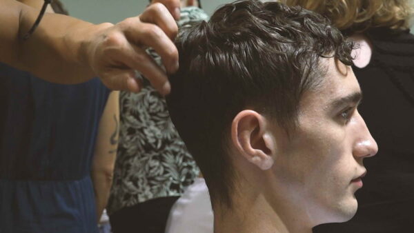 Trendy surfer hairstyles for men with Tina Outen for MSGM