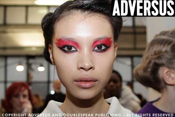 Red and black, punk sexy and beautiful makeup by Tom Pecheux for Antonio Marras