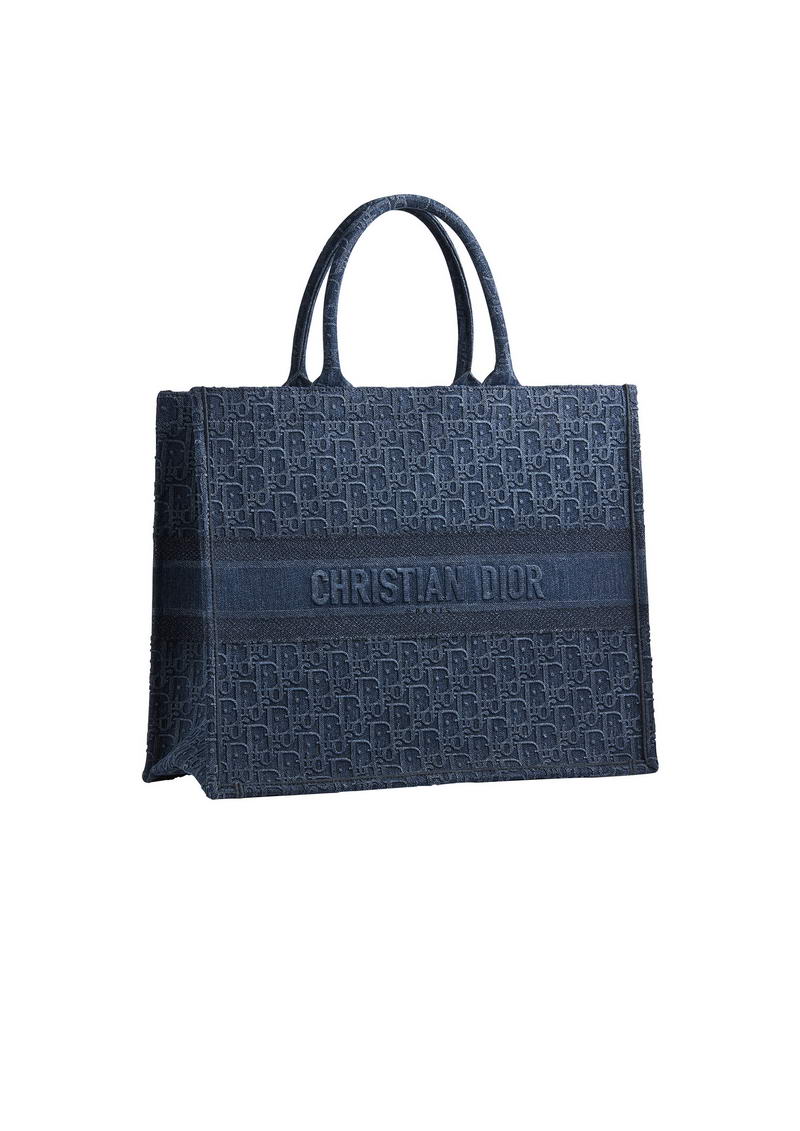 “Dior Book Tote'' bag in denim Dior oblique embroidered canvas. HK$ 24,000